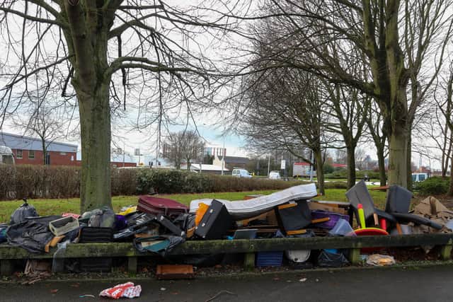 Flytippers leave rubbish on Victoria Road in Birmingham as councils report problems collecting rubbish as refuse teams go off sick with Covid