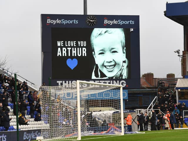 The TV screen shows a tribute to Arthur Labinjo-Hughes prior to the Sky Bet Championship match between Birmingham City and Cardiff City at St Andrew’s Trillion Trophy Stadium on December 11, 2021 (Tony Marshall/Getty Images)