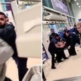 Shocking footage shows the moment a mass brawl broke out inside the Tesco superstore in Aston while a fearless pensioner casually continued her shopping