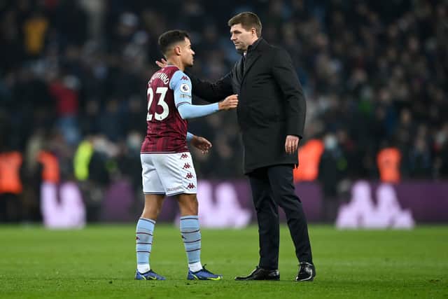 Steven Gerrard, Manager of Aston Villa interacts with Philippe Coutinho of Aston Villa following the Premier League match between Aston Villa and Manchester United at Villa Park