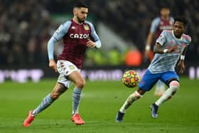 Morgan Sanson of Aston Villa is closed down by Fred of Manchester United during the Premier League match between Aston Villa and Manchester United at Villa Park. 