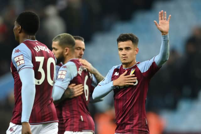 Philippe Coutinho of Aston Villa celebrates after scoring their side's second goal during the Premier League match between Aston Villa and Manchester United at Villa Park 