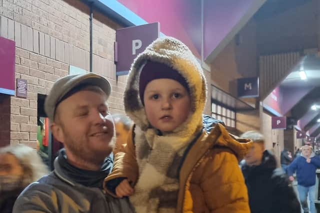 Aston Villa fan Brett with his son Leo at Villa Park