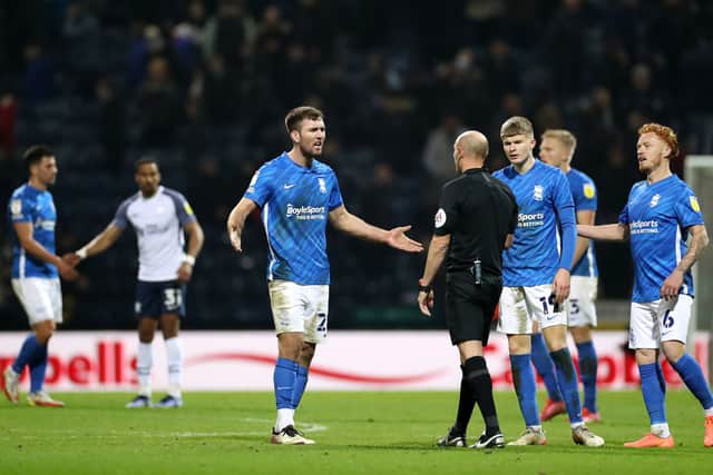 Gary Gardner of Birmingham City reacts towards Match Referee, Andy Davies at full time after the Sky Bet Championship match between Preston North End and Birmingham City at Deepdale