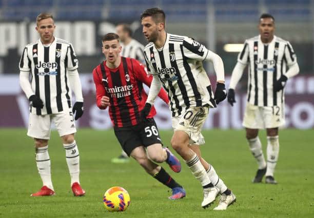Rodrigo Bentancur in possession for Juventus against AC Milan on Sunday. Picture: Marco Luzzani/Getty Images.