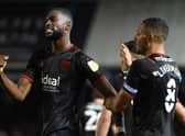 Semi Ajayi of West Bromwich Albion celebrates scoring his team's first goal with teammate Jake Livermore during the Sky Bet Championship match between Peterborough United and West Bromwich Albion