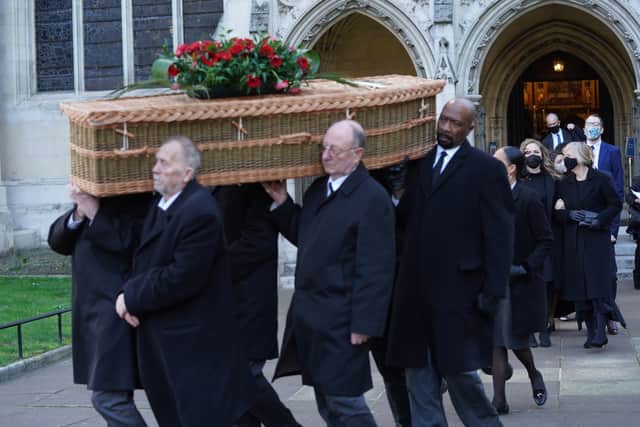 The casket of of Labour MP Jack Dromey is carried from St Margaret’s Church in Westminster, London, following his funeral service