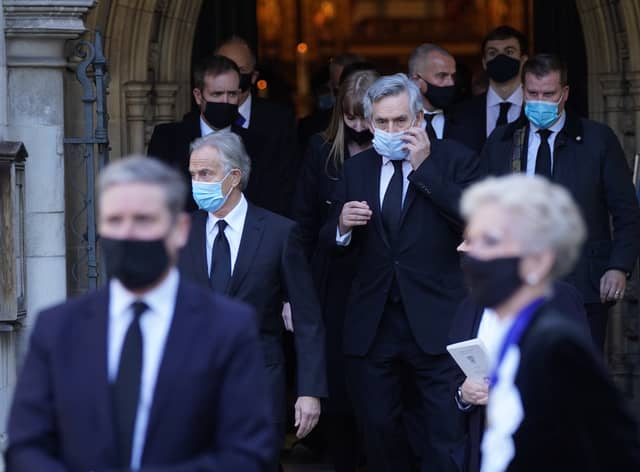 Former prime ministers Tony Blair (left) and Gordon Brown (centre) leave the funeral service of Labour MP Jack Dromey at St Margaret's Church in Westminster, London. Picture date: Wednesday January 26, 2022.