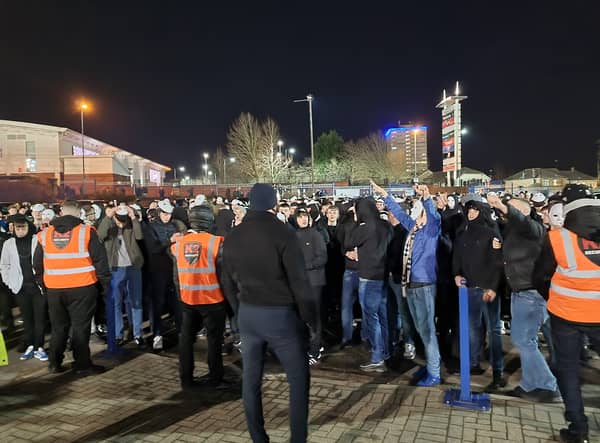 Blues fans gathered outside St Andrew’s wearing faceless masks to protest against the owners