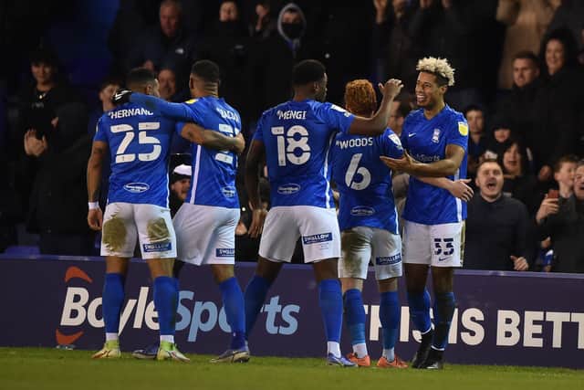 Lyle Taylor of Birmingham City (R) celebrates with team mates after opening the scoring during the Sky Bet Championship match between Birmingham City and Sheffield United