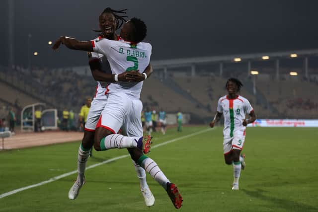 Burkina Faso's forward Djibril Cheick Ouattara (2ndL) celebrates with Burkina Faso's forward Bertrand Traore after scoring his team's third goal during the Africa Cup of Nations (CAN) 2021 third place football match between Burkina Faso and Cameroon