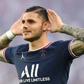 Paris Saint-Germain’s Argentinian forward Mauro Icardi celebrates after scoring a goal during the French L1 football match between Paris Saint-Germain and Racing Club Strasbourg at the Parc des Princes stadium in Paris on August 14, 2021