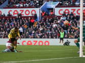 Emmanuel Dennis, of Watford , scores the first goal during the Premier League match between Aston Villa and Watford at Villa Park on February 19, 2022.