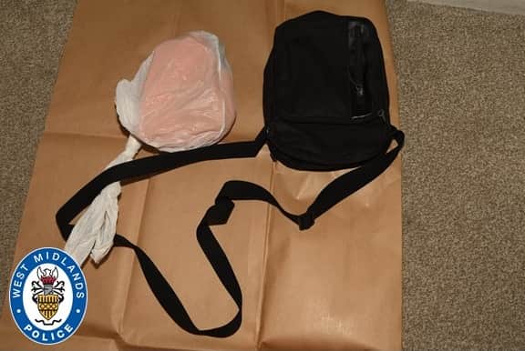 Simon Mahli’s man bag containing a gun and ammunition
