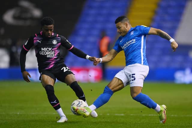  Onel Hernandez of Birmingham City battles for the ball with Bali Mumba of Peterborough United during the Sky Bet Championship match between Birmingham City and Peterborough United 