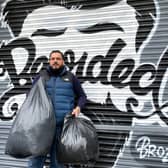 Imran Hameed, founder of the volunteer group Bearded Broz in Smethwick, with some donations of clothing to send to Ukrainians fleeing into Poland following the Russian invasion