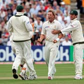 Shane Warne is congratulated by Ricky Ponting and team-mates after taking the wicket of Ashley Giles at Edgbaston in 2005. Picture: Tom Shaw/Getty Images.