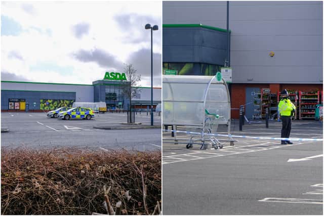 Police at the scene in Redditch following the death of a 53 year old man outside the Asda supermarket on Jinnah Road. 