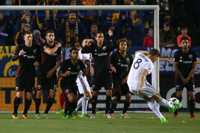 Steven Gerrard #8 of Los Angeles Galaxy takes a  direct free kick against D.C. United in the first half during their MLS match at StubHub Center