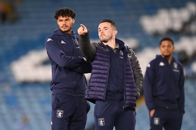 Tyrone Mings and JohnÂ McGinn of Aston Villa inspect the pitch prior to the Premier League match between Leeds United and Aston Villa at Elland Road 