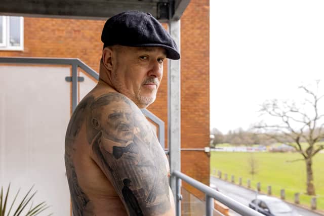 Peaky Blinders superfan David Hatfield who has spent £6,000 covering his back and arms in tattoos devoted to the hit BBC show.
