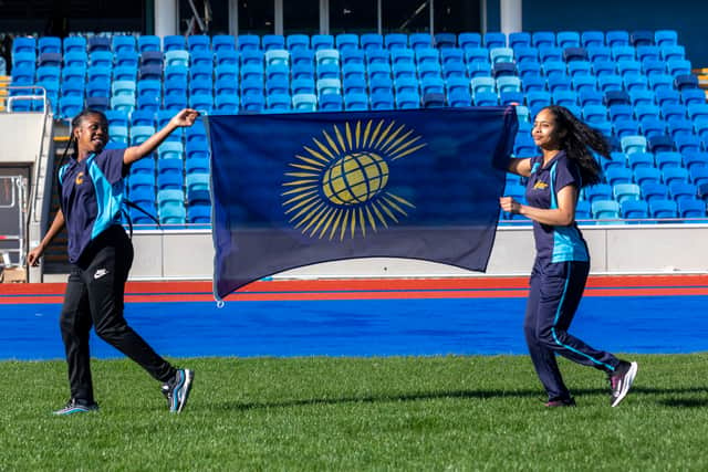 Pupils from the Jewellery Quarter Academy with the Commonwealth flag