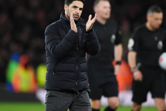 Arsenal manager Mikel Arteta applauds the Arsenal fans after the Premier League match between Arsenal and Liverpool at Emirates Stadium. Credit: Stuart MacFarlane/Arsenal FC via Getty Images