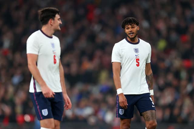 Tyrone Mings talks to Harry Maguire of England during the international friendly match between England and Cote D’Ivoire at Wembley Stadium on March 29, 2022 in London, England. (Photo by Catherine Ivill/Getty Images)