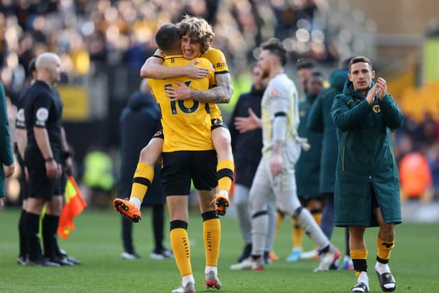 Conor Coady and Fabio Silva of Wolverhampton Wanderers celebrates at the full time whistle after the Premier League match between Wolverhampton Wanderers and Aston Villa at Molineux