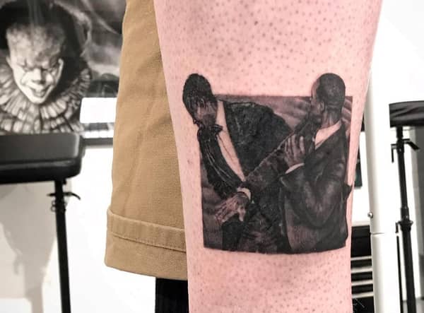Tattoo artists Jon Arton inks the moment Will Smith slapped Chris Rock