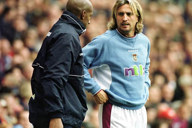 David Ginola of Villa speeks to team mates Dion Dublin during the match between Aston Villa and Blackburn Rovers in the FA Barclaycard Premiership at Villa Park in 2001