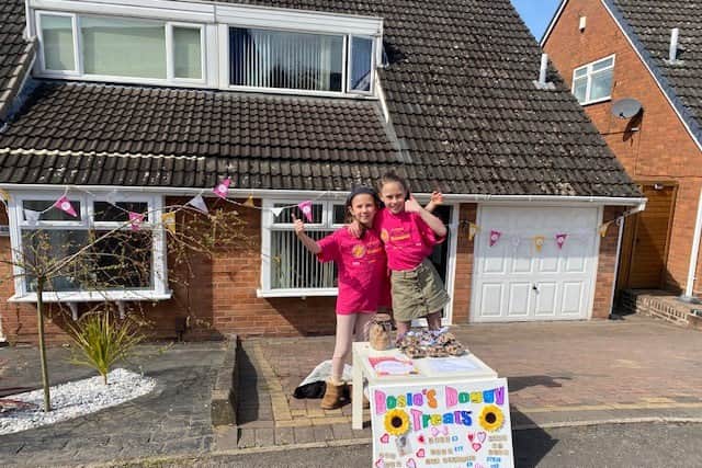 Rosie Parker set up shop in her street to sell dog biscuits and sold out in 90 minutes to raise money for brain tumour research in memory of her cousin Tom Parker from The Wanted