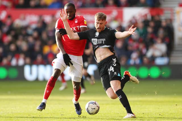 Cundy battles for possession during Nottingham Forest fixture