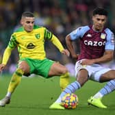Max Aarons of Norwich City and Ollie Watkins of Aston Villa during the Premier League match between Norwich City and Aston Villa at Carrow Road on December 14, 2021