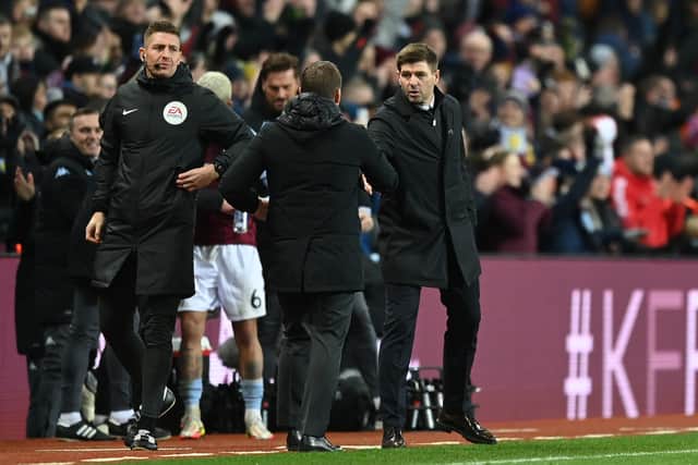 Steven Gerrard, Manager of Aston Villa and Brendan Rogers, Manager of Leicester City shake hands following the Premier League match between Aston Villa  and  Leicester City at Villa Park on December 05, 2021