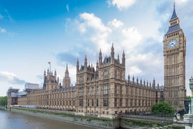 A Tory MP allegedly watched porn on his mobile phone while sitting next to a female minister in the House of Commons,. (Credit: Adobe)