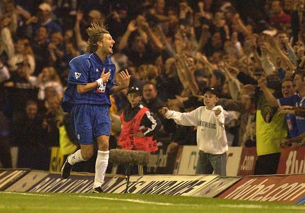 Robbie Savage celebrates with fans as Blues enjoy a 3-0 win against Villa in 2002. Picture: Ross Kinnaird/Getty Images.