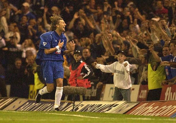Robbie Savage celebrates with fans as Blues enjoy a 3-0 win against Villa in 2002. Picture: Ross Kinnaird/Getty Images.