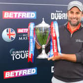 Richard Bland of England poses with The Betfred British Masters trophy after winning the playoff in the Final Round of The Betfred British Masters 2021