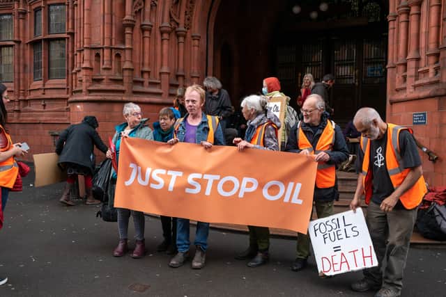 Just Stop Oil demonstrators gathered outside Birmingham Magistrates’ Court today