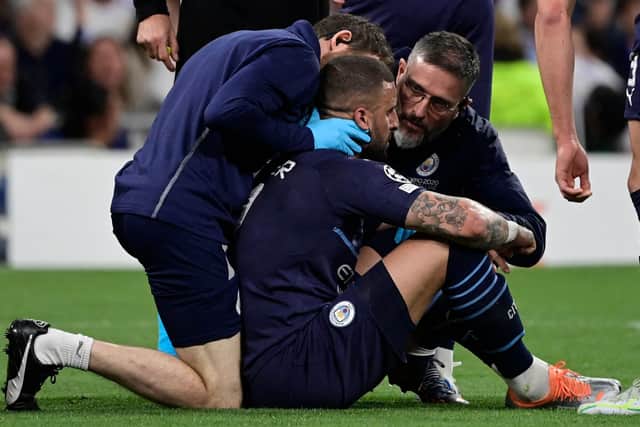 Kyle Walker receives treatment during Man City’s loss to Real Madrid. Picture: JAVIER SORIANO/AFP via Getty Images