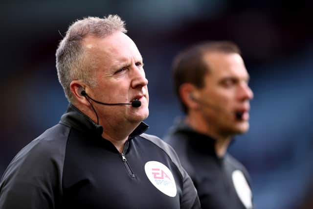 Referee Jonathan Moss looks on during the Premier League match between Aston Villa and Liverpool at Villa Park