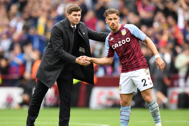  Steven Gerrard, Manager of Aston Villa, shakes hands with Matty Cash of Aston Villa after the final whistle of the Premier League match between Aston Villa and Crystal Palace at Villa Park