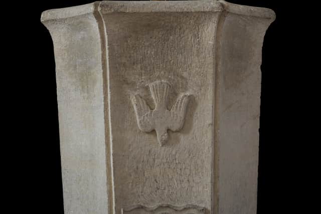 A tapered font with dove, 1954-5 by F.J. Osborne, at All Saints Church, Ownall Road, Shard End, Birmingham