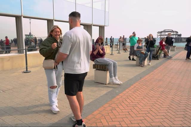Craig Calvert, from Kings Norton, Birmingham, proposes to girlfriend Natalie with a flash mob dance in Brighton