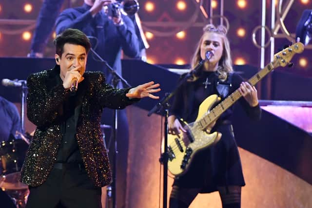 Brendon Urie (L) and Nicole Row of Panic! at the Disco perform during the 2019 Billboard Music Awards at MGM Grand Garden Arena on May 1, 2019 in Las Vegas, Nevada. 