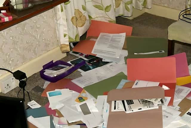 David Varlow’s ransacked house with papers strewn on the floor after burglary by murderer Adris Mohammed