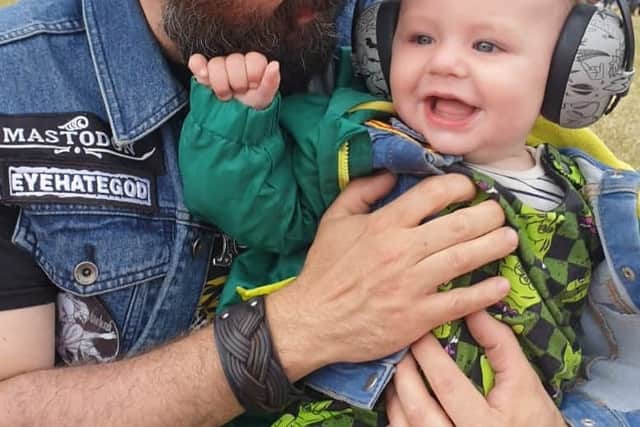 Dad Andrew Harris with son Ziggy at Download Festival as Mum Anne Shirley shares her best tips for taking babies to festivals