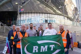 A picket line is seen outside Birmingham New Street station, as members of the Rail, Maritime and Transport union begin their nationwide strike in a bitter dispute over pay, jobs and conditions