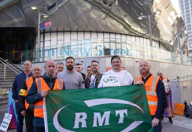 <p>A picket line is seen outside Birmingham New Street station, as members of the Rail, Maritime and Transport union begin their nationwide strike in a bitter dispute over pay, jobs and conditions</p>